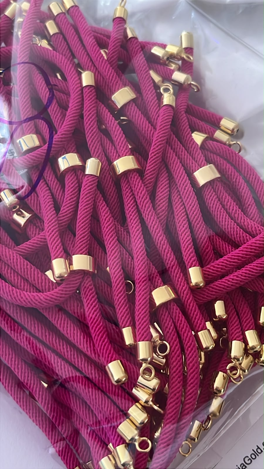 PORTA PULSERA TELA ROSA FUCSIA